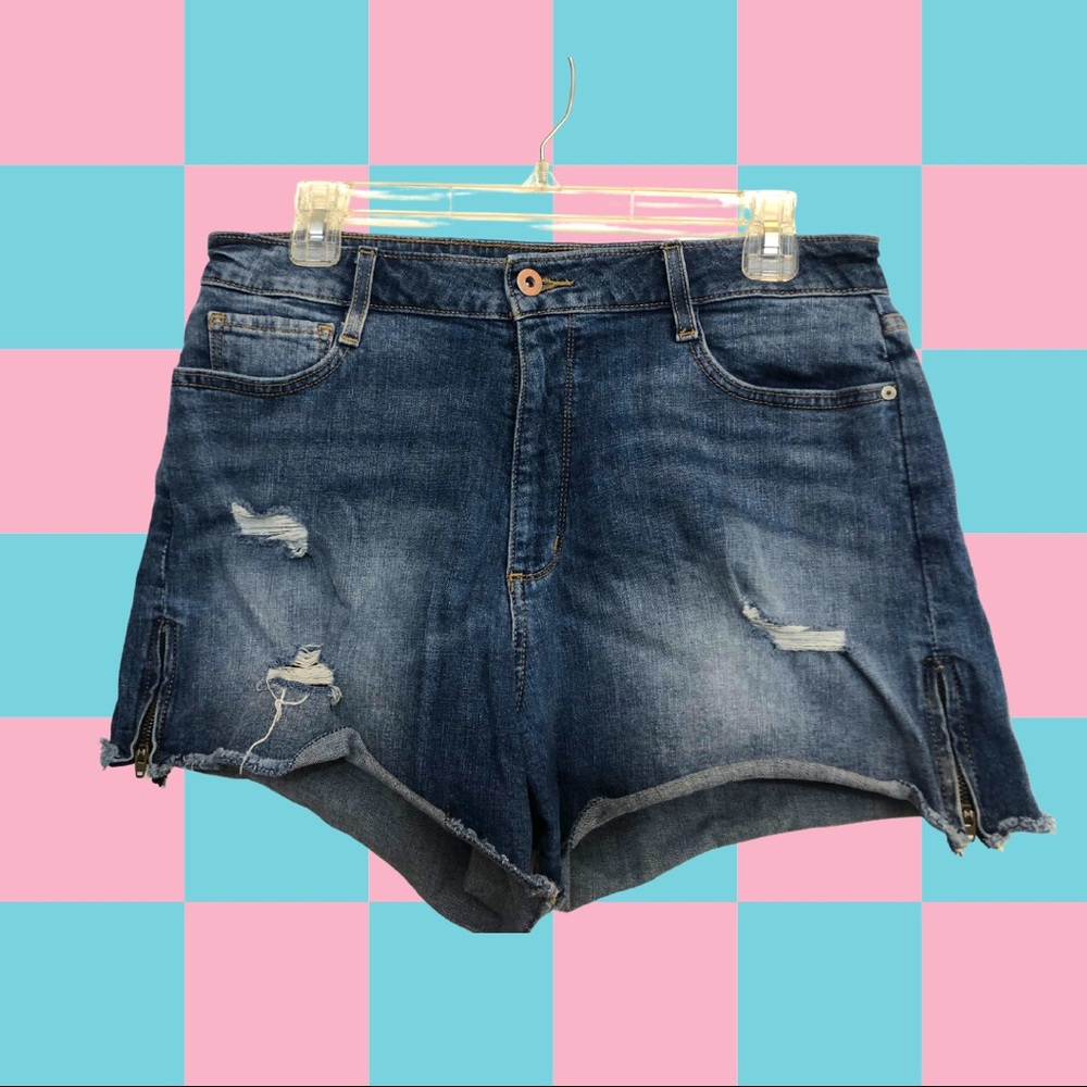Dark wash distressed short shorts.